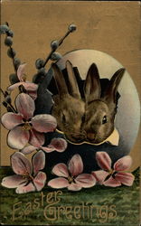 Easter bunnies with flowers Postcard