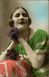 Woman in Green Dress holding Violets Women Postcard Postcard