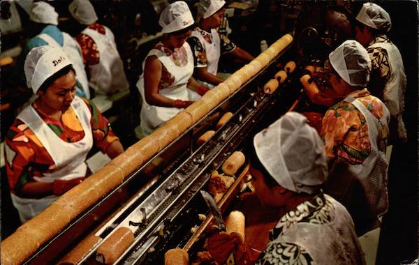 Women Carving Pineapple
