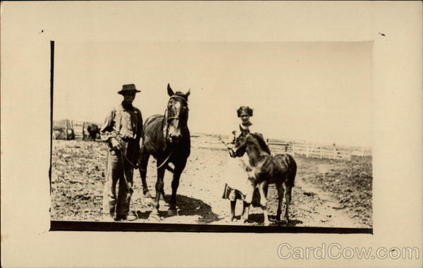 A Man and His Horse With a Woman and Her Pony Horses
