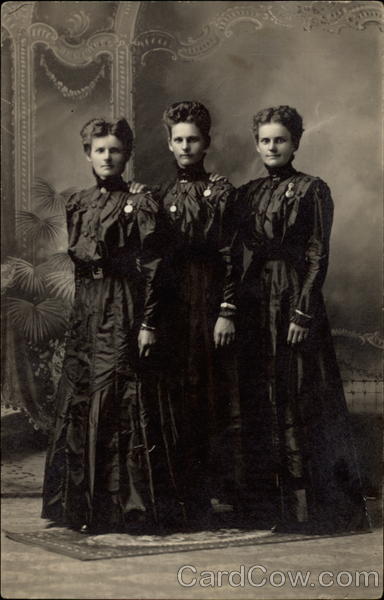 Three Women in Black Dresses