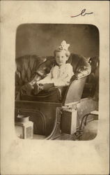 Little Girl Sitting in Leather Chair Postcard