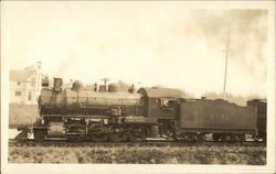 A Train Stopped Outside Town Locomotives Postcard Postcard