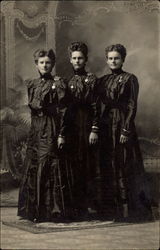 Three Women in Black Dresses Three Women in Black Dresses
