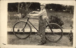 Boy with his bicycle Postcard