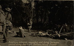 American advance, wounded and dying Germans spread along the road Postcard