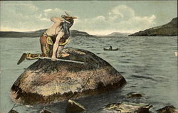 Indian on a rock looking out to the water, Otsego Lake Postcard