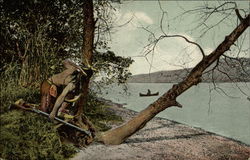 Indian warrior waiting for the approach of a canoe Postcard