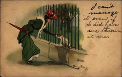 Woman Petting A Dog Through a Fence Postcard