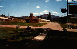 Raynor's Motor Lodge Postcard