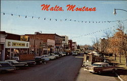 View Looking West of Front Street Malta, MT Postcard Postcard