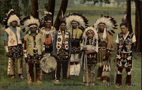 Native Americans in headresses,dance dress Native Americana