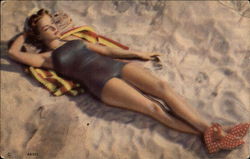 Beautiful Woman Sunbathing on the Beach Postcard