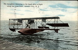 The Aeroplane returning to the beach after a flight along the ocean front Atlantic City, NJ Aircraft Postcard Postcard