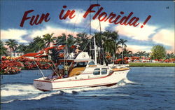 Fun in Florida, view of yacht on water and flowers Postcard