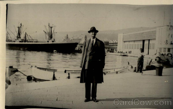 Businessman standing on Pier Trieste Italy