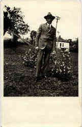Man in Flower Garden Postcard