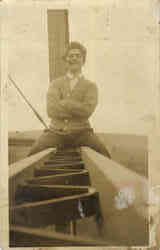 Man Sitting on Steel Girder Postcard