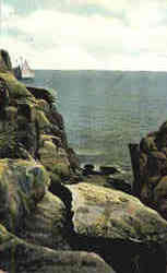 Raef's Charm, Rocks on Ocean w/Sailboat Postcard