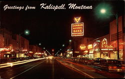 Main Street at Night Kalispell, MT Postcard Postcard