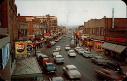 Twilight View of Main Street Postcard