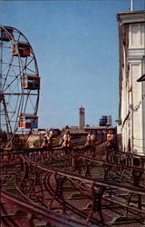 The Steeplechase and Ferris Wheel in Steeplechase Park Postcard