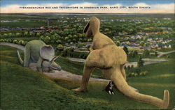 Tyrannosaurus Rex and Triceratops in Dinosaur Park Rapid City, SD Postcard Postcard