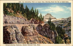 An Interesting View on Logan Pass, Showing Road Cut Out of Solid Rock, Going-to-the-Sun Highway Postcard