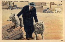 Dr. E. H. McCleery and His Famed Wolf Pack Postcard