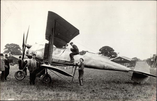 People Standing Next to An Airplane Aircraft