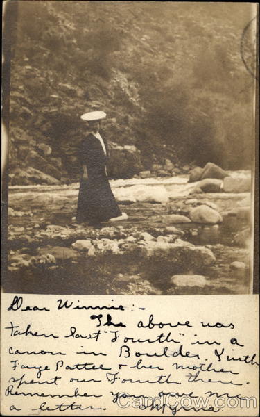 Woman standing in canon on river Boulder Colorado