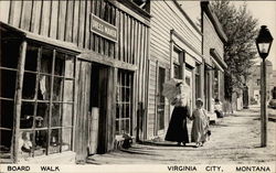 Boardwalk with Dress Maker's and Pedestrians Virginia City, MT Postcard Postcard