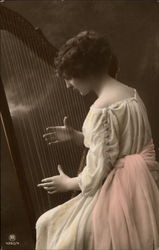 A Woman Playing a Harp Postcard