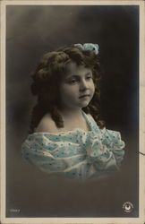Young girl in blue dot dress Postcard