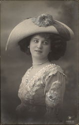 A Woman Wearing a Large Hat Postcard