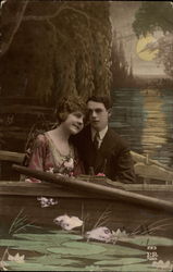 Couple in boat - romantic Postcard