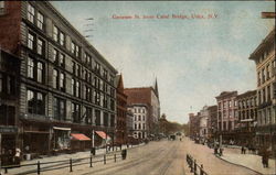 View of Genesee St. from Canal Bridge Postcard