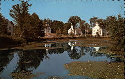 A classic small village behind a mill pond Marlow, NH Postcard Postcard