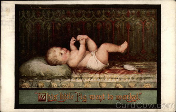 Baby playing with its toes Babies