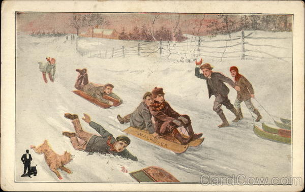 Boys sledding in snow Children