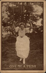 Woman in long dress on swing (photo) Postcard