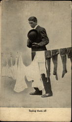 Man looking at underclothes on line Postcard