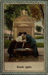 Woman and man kiss near a fountain in a park Couples Postcard Postcard