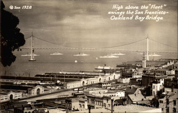 High above the Fleet swings the San Francisco-Oakland Bay Bridge California