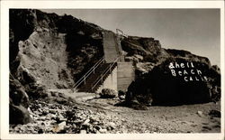 Stairs leading to rocky beach Shell Beach, CA Postcard Postcard