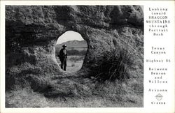 Texas Canyon, Looking toward Draggon Mountains through Portrait Rock Postcard