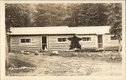 Cabin with stretched out bearskin Postcard