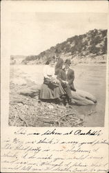 Two men and a girl posing beside lake Parkdale, CO Postcard Postcard