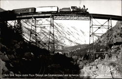 Old time train oveer high bridge on Georgetown Loop Postcard
