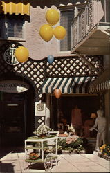Shops on one of Worth Avenue's many Via's Postcard